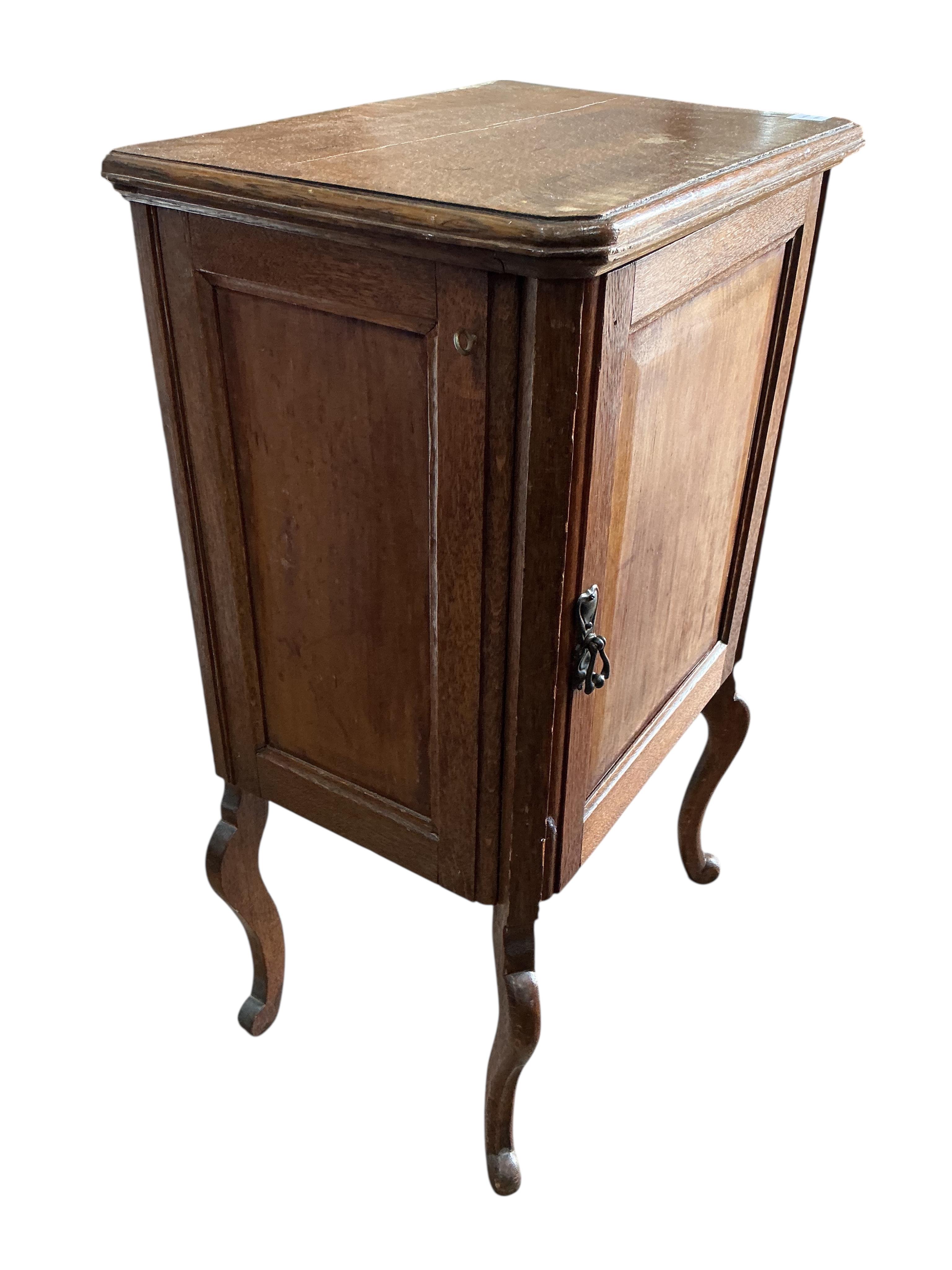 A 19th century French oak side cabinet, width 54cm, depth 38cm, height 94cm
